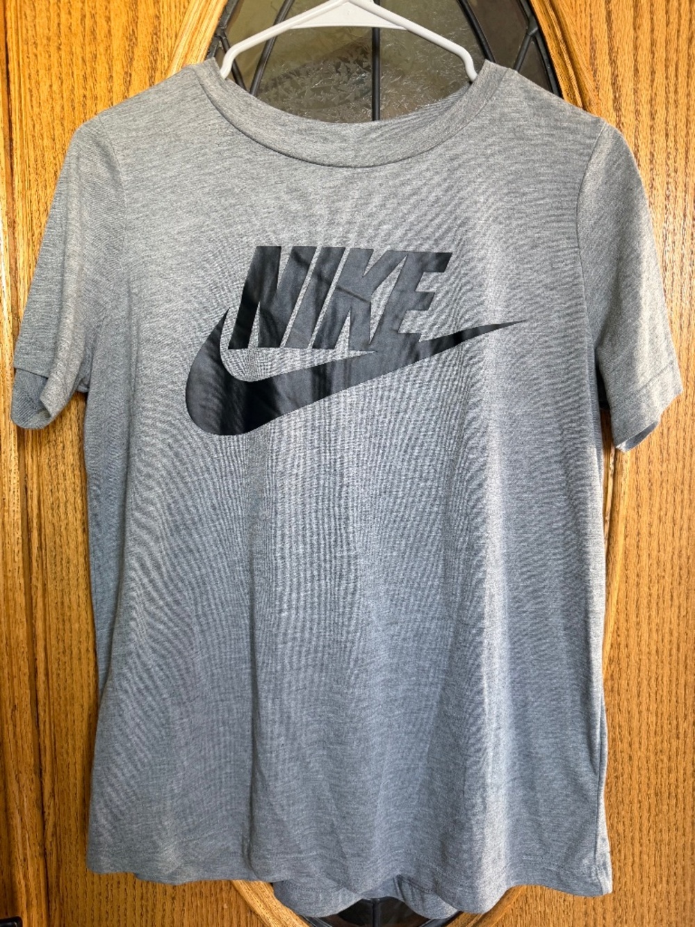 Grey Nike t-shirt with black logo M